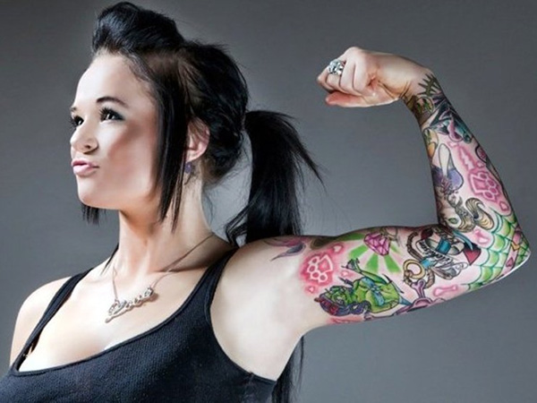Woman with full sleeve tattoo